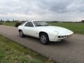 928- E